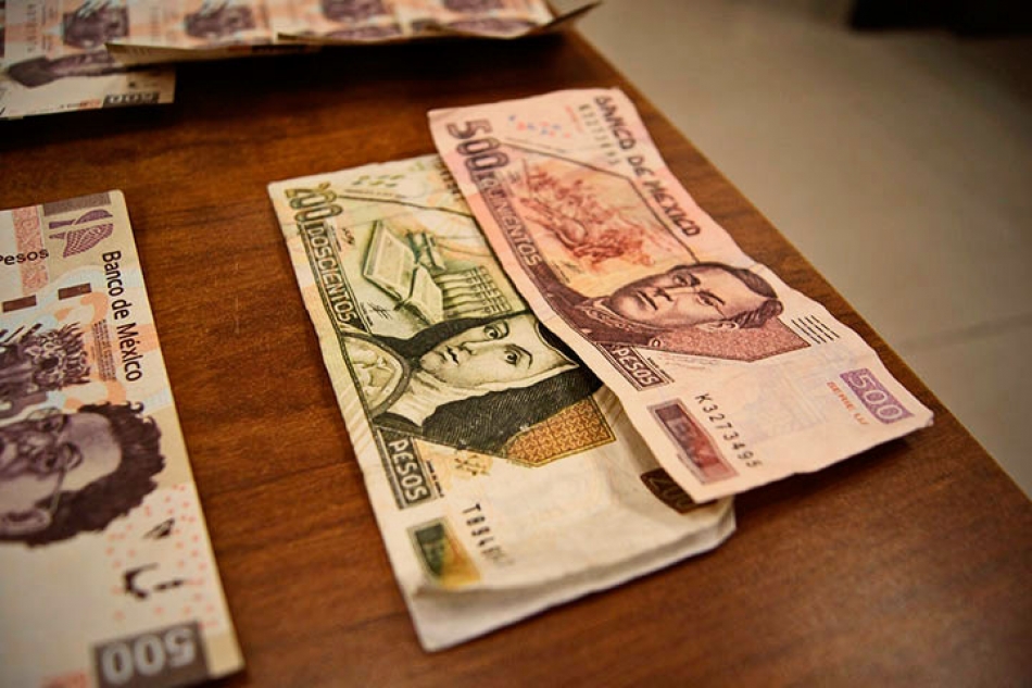 Aumenta el pago con billetes falsos: comerciantes