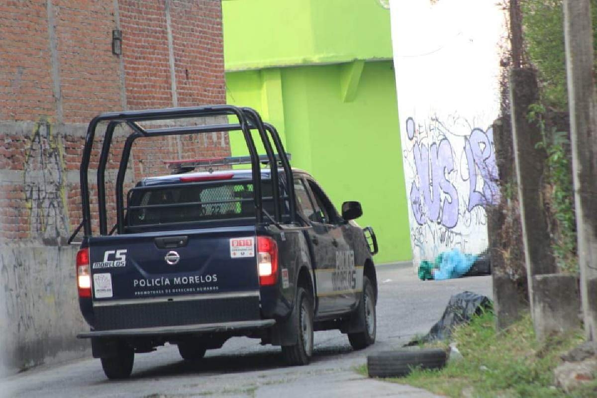 Abandonan un cadáver embolsado en Tejalpa