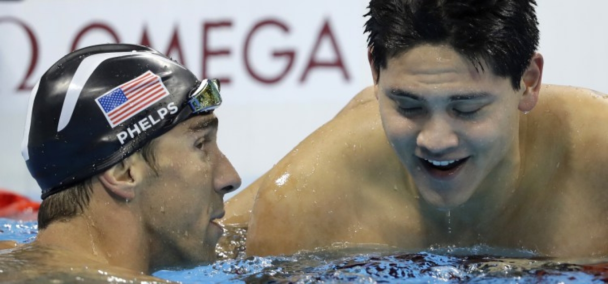 Schooling: un día se toma una foto con su ídolo y otro le quita el oro