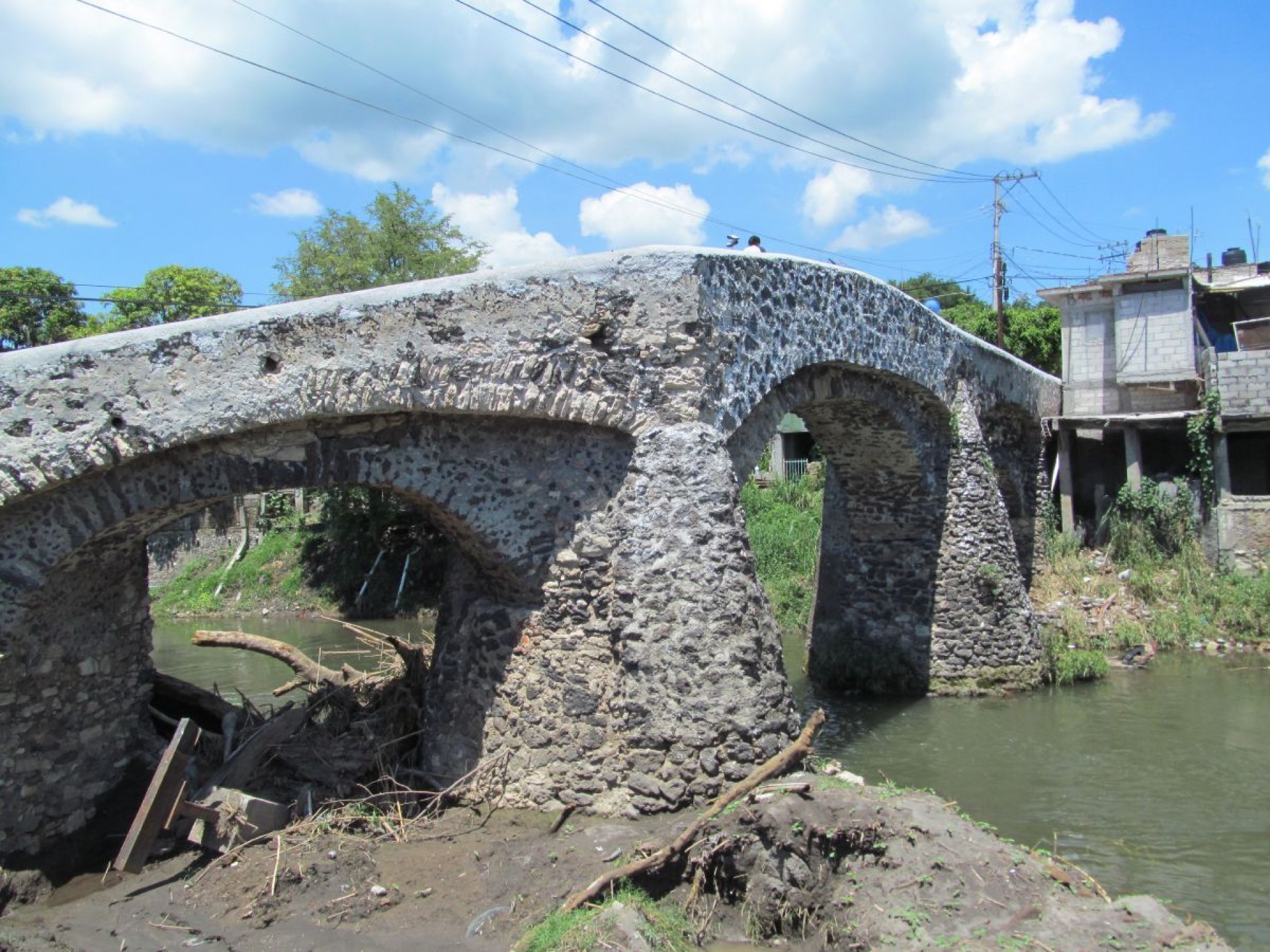 Esperan segunda etapa para puente histórico de Tlaquiltenango