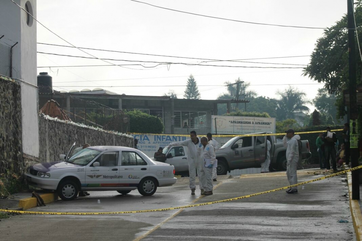 Balean a un taxista y a una mujer; él falleció