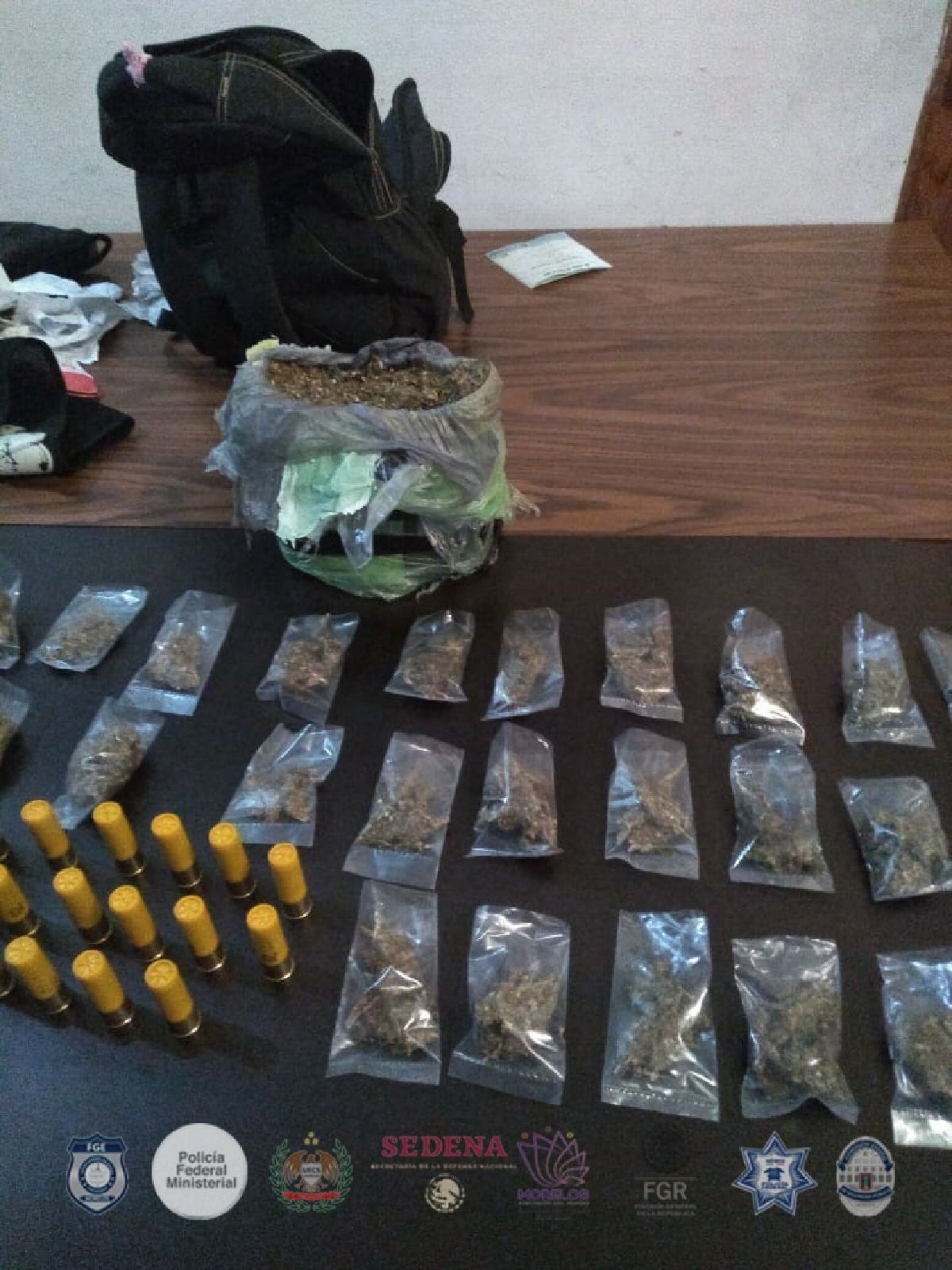 Detienen a dos presuntos narcomenudistas en Tlaquiltenango