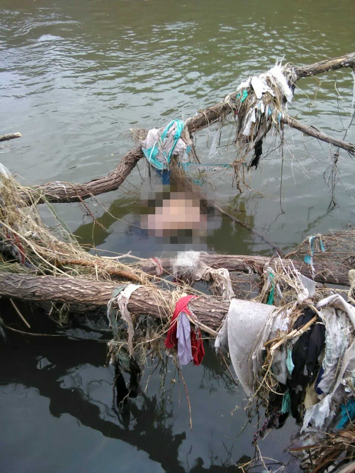 Localizan un cadáver en el río Apatlaco