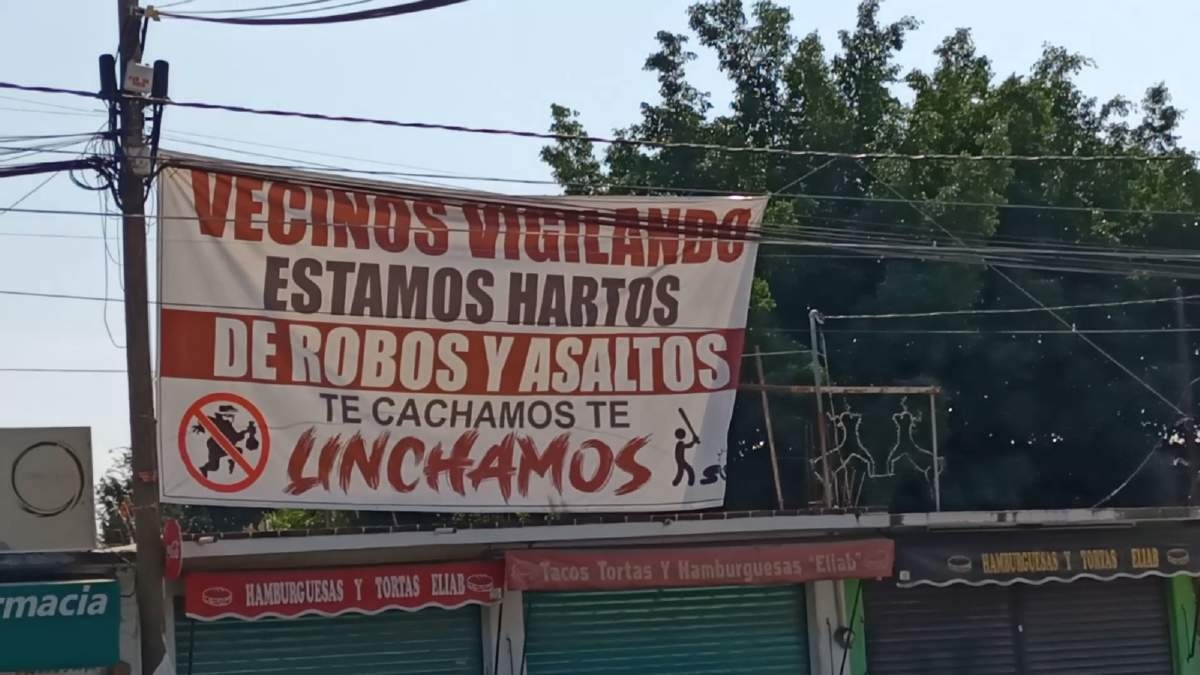 Quitan mantas colocadas por vecinos contra la delincuencia