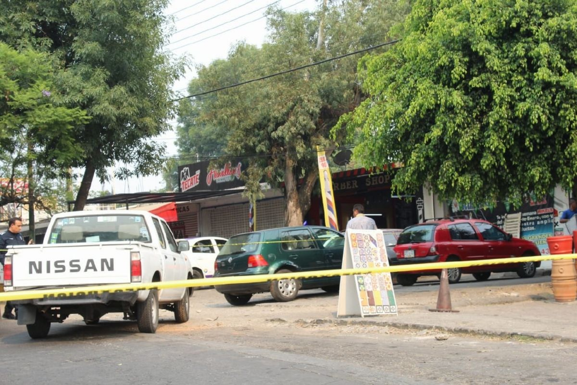 Acribillan a dos hermanos en su barbería