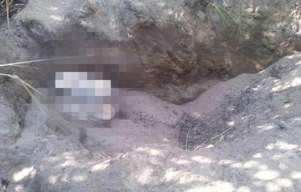 Localizan un cadáver semienterrado en Amacuzac